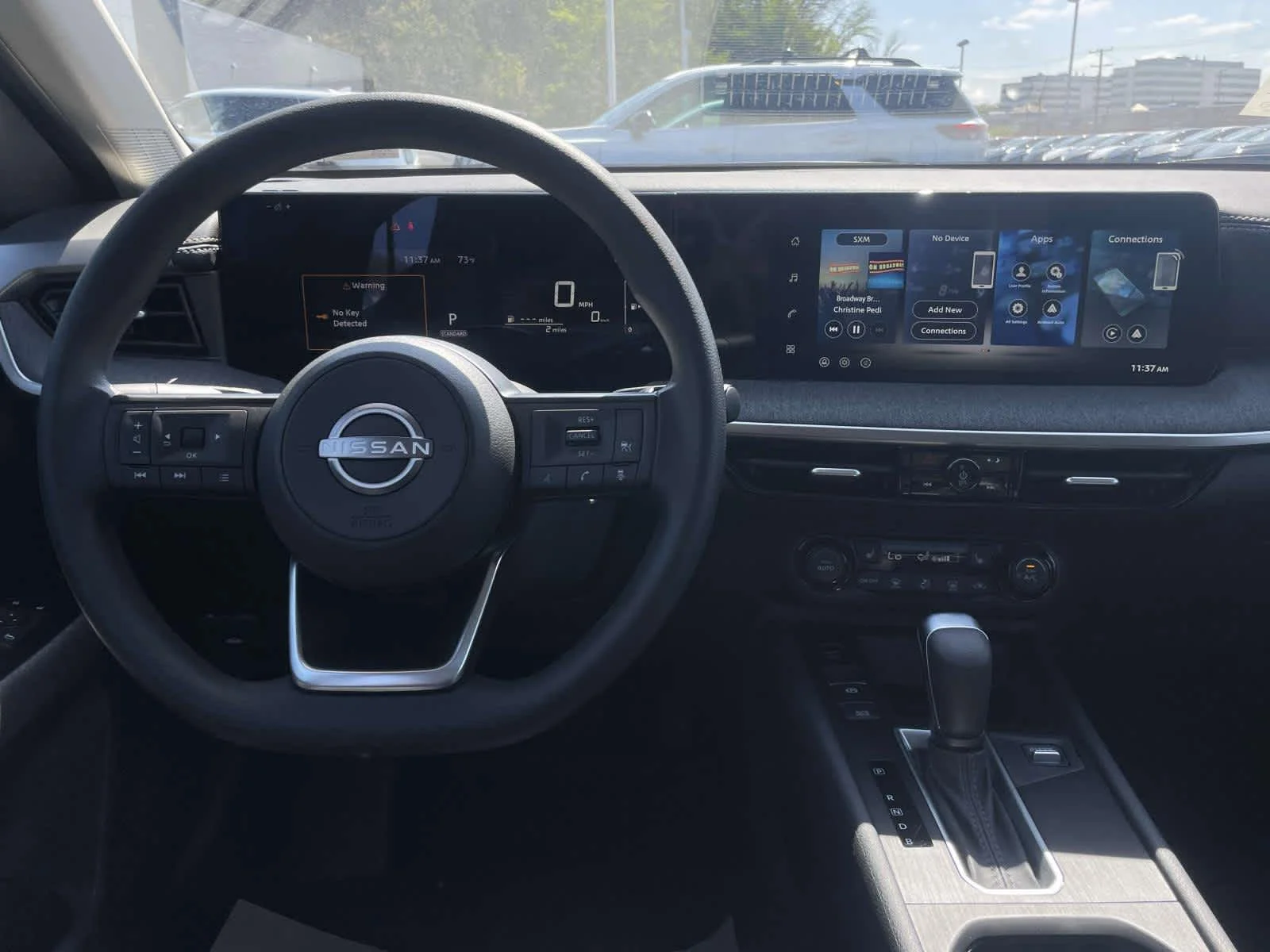 New 2026 Super Black Nissan SV image 2