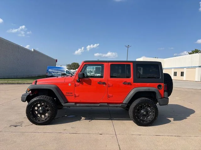 Used 2015 Orange Jeep Unlimited Sport image 2