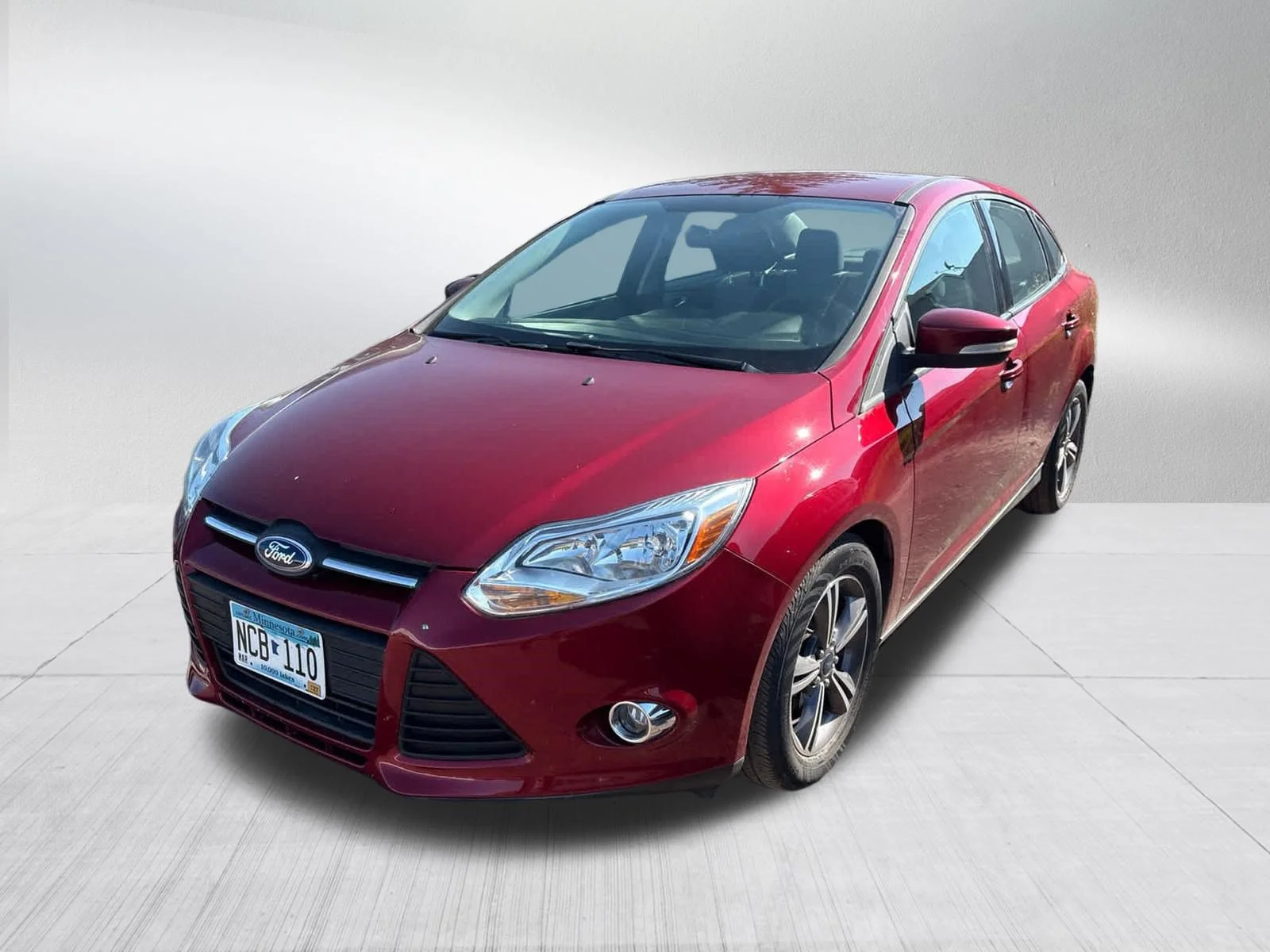 Used 2014 Ruby Red Tinted Clearcoat Ford SE image 2
