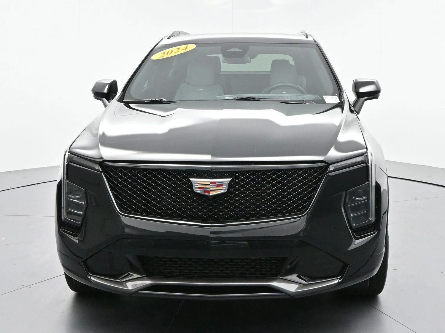 Used 2024 Stellar Black Metallic Cadillac Sport image 2