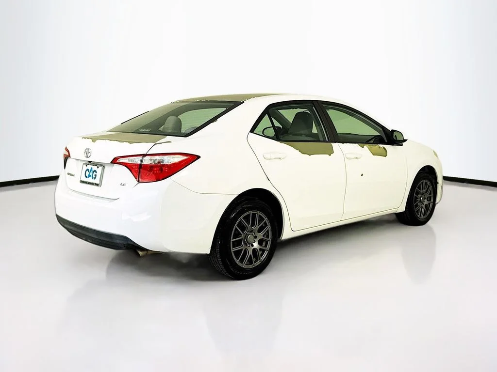 Used 2015 Super White Toyota LE image 7