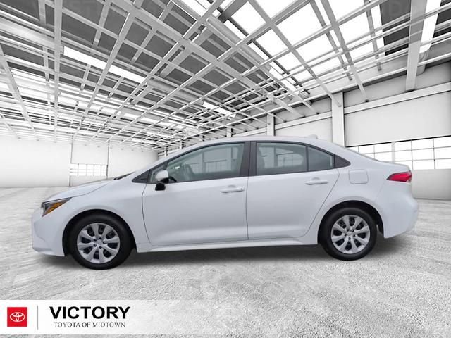 Used 2024 White Toyota LE image 7