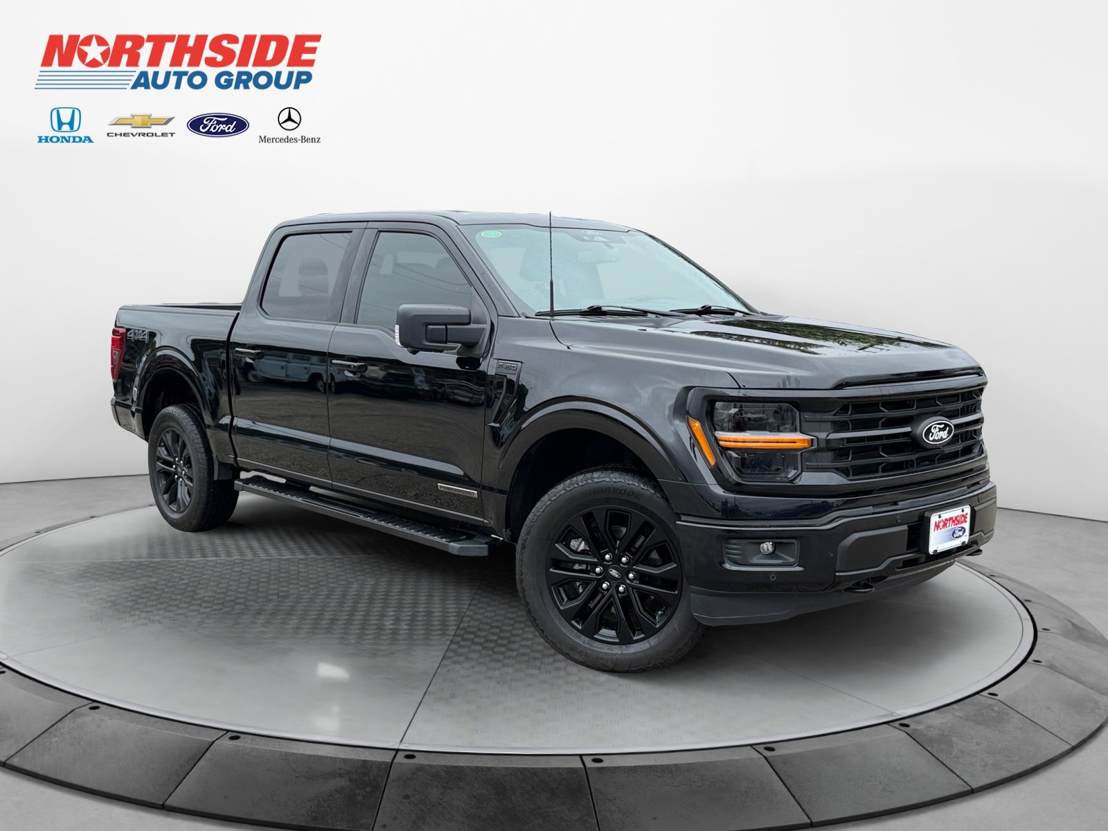 Certified Used 2024 Agate Black Metallic Ford XLT image 1