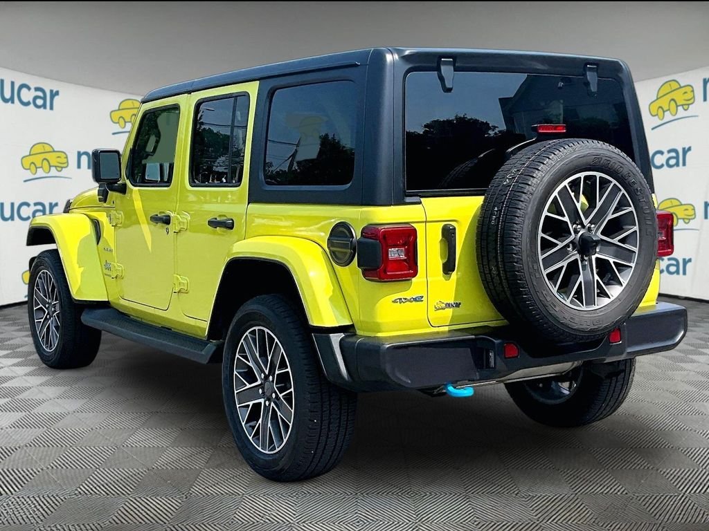 Used 2023 Yellow Jeep Sahara 4xe image 4