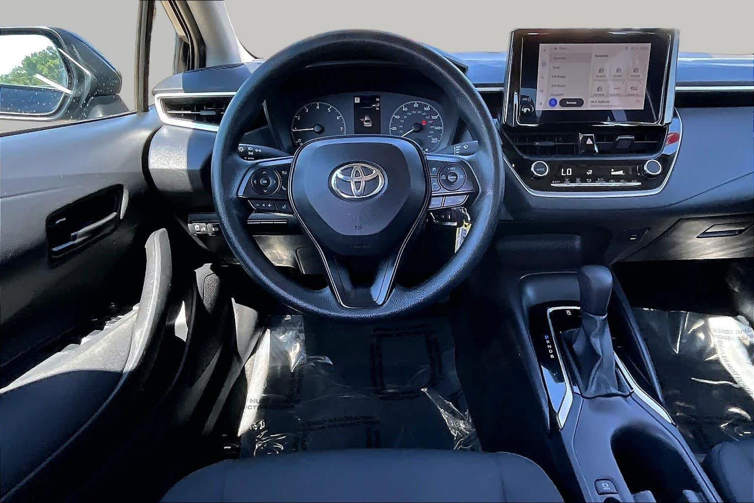 Used 2023 Midnight Black Metallic Toyota LE image 5