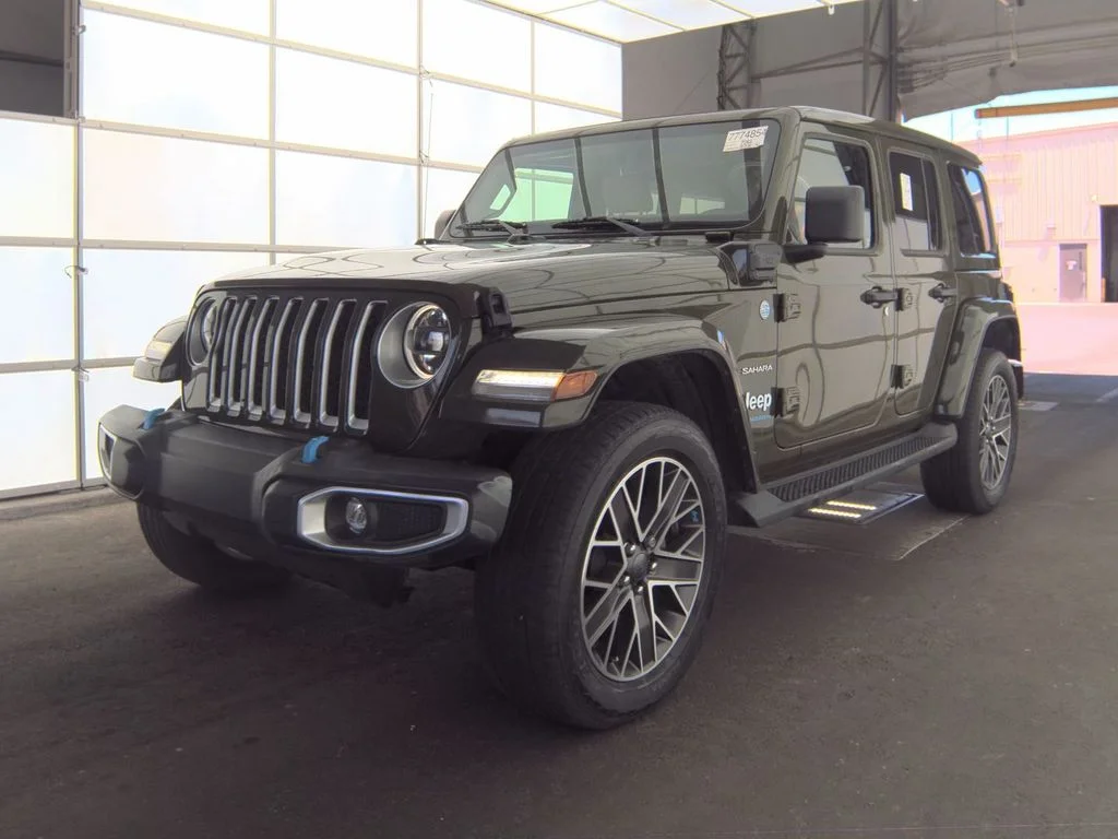 Used 2023 Green Jeep Sahara 4xe image 1