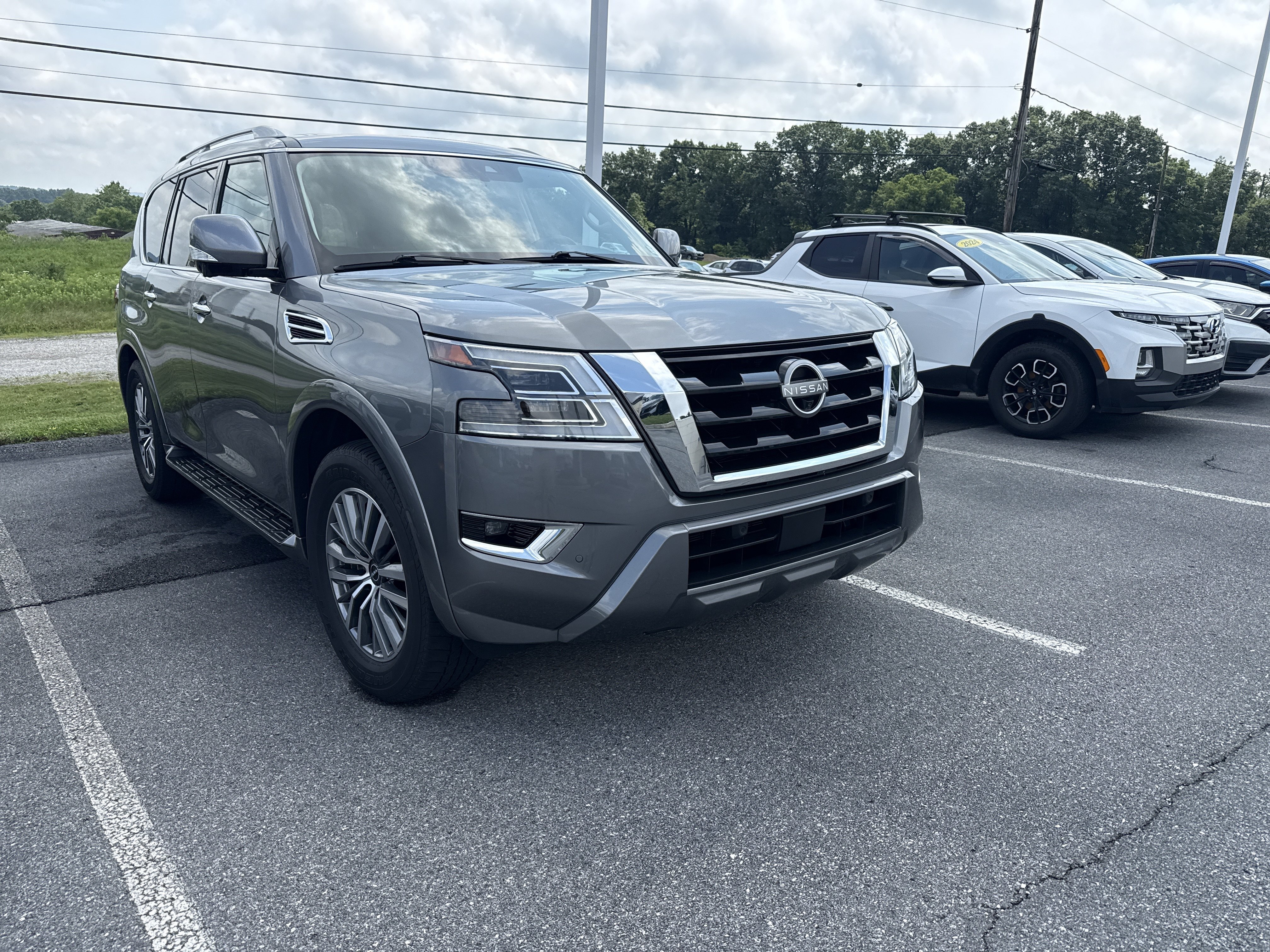 Used 2024 Gun Metallic Nissan SL image 1
