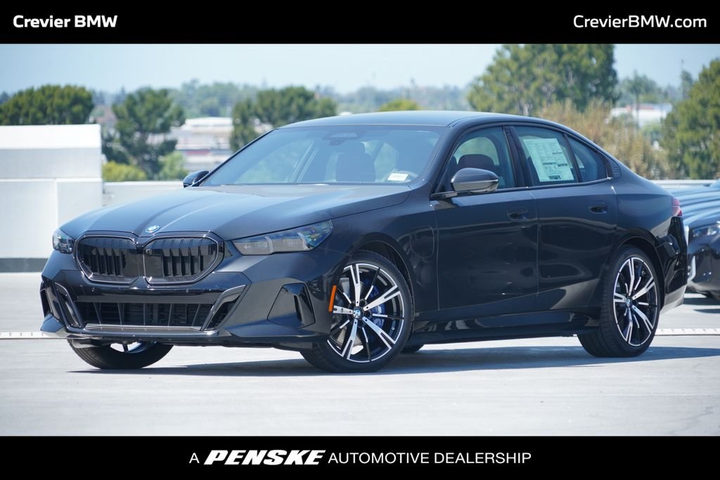 New 2027 Black Sapphire Metallic BMW 550e xDrive image 1