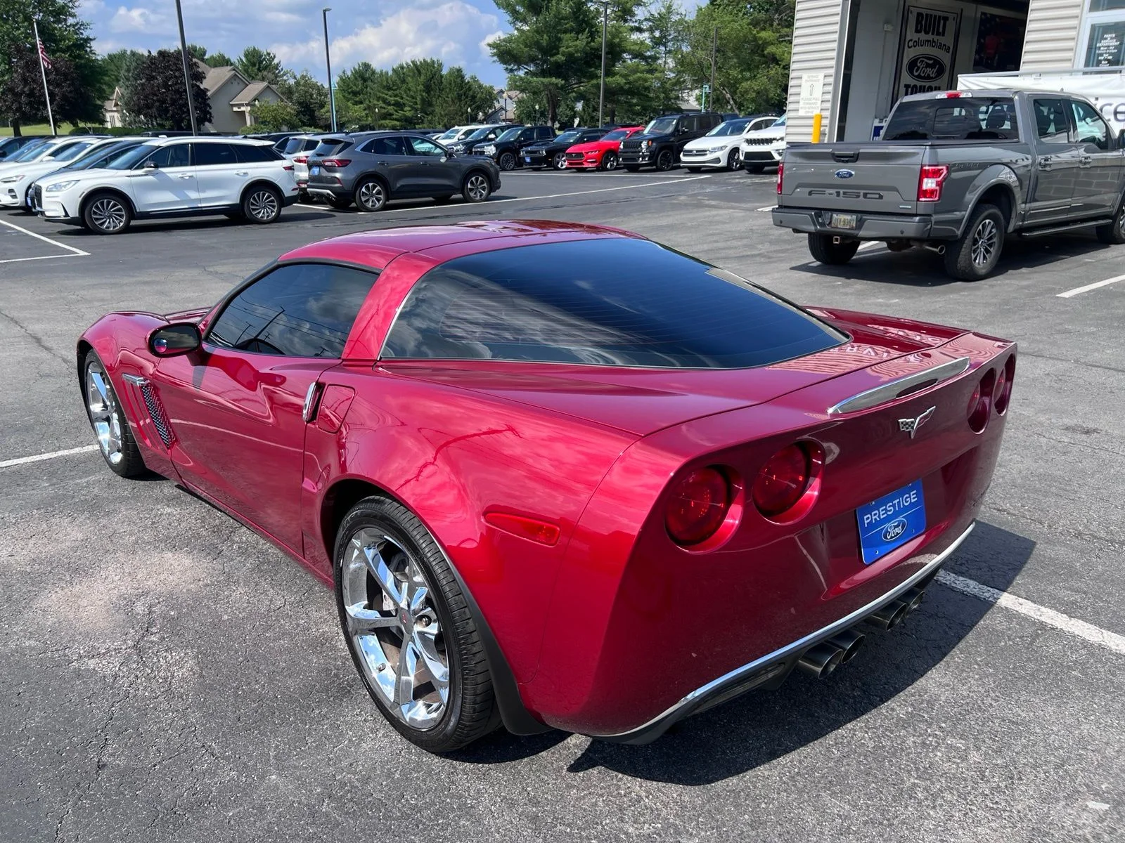 Used 2012 Crystal Red Tintcoat Chevrolet Grand Sport image 7