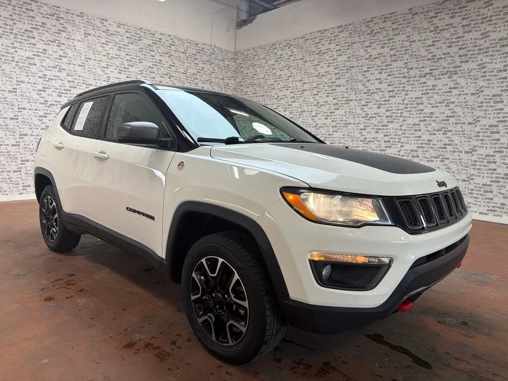 Used 2019 White Clearcoat Jeep Trailhawk image 1
