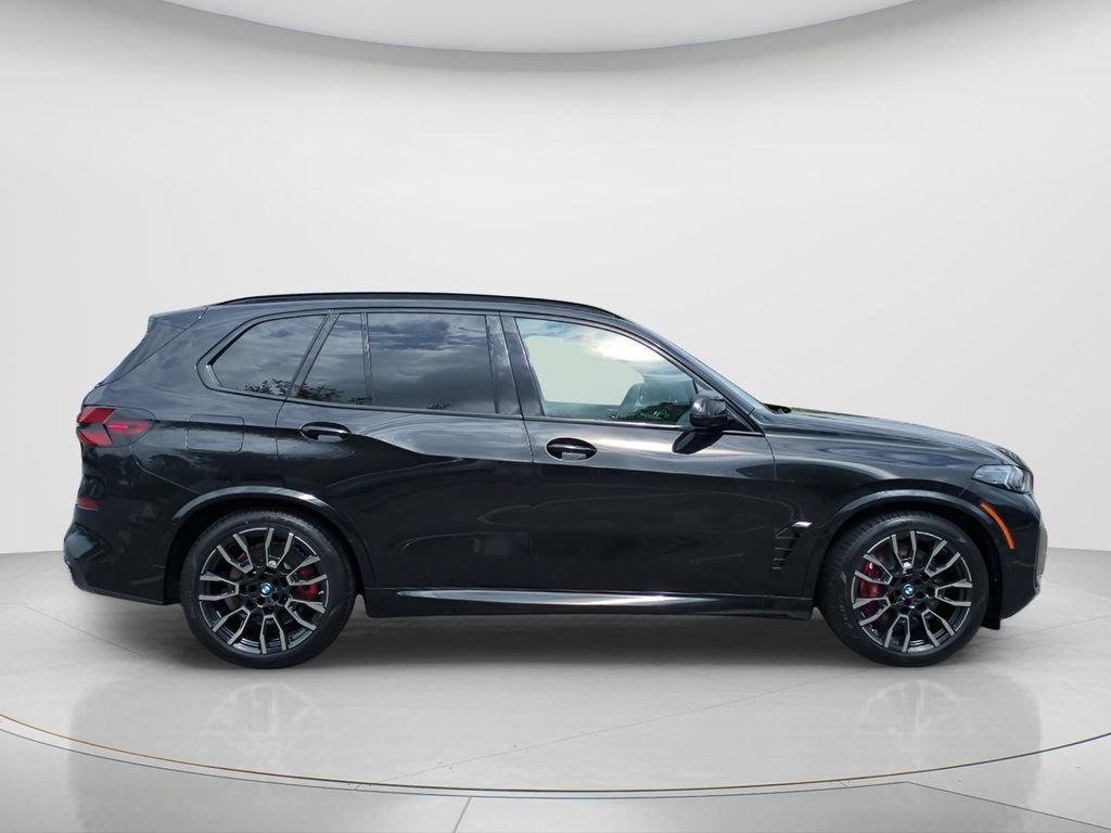 New 2026 Black Sapphire Metallic BMW xDrive50e image 11