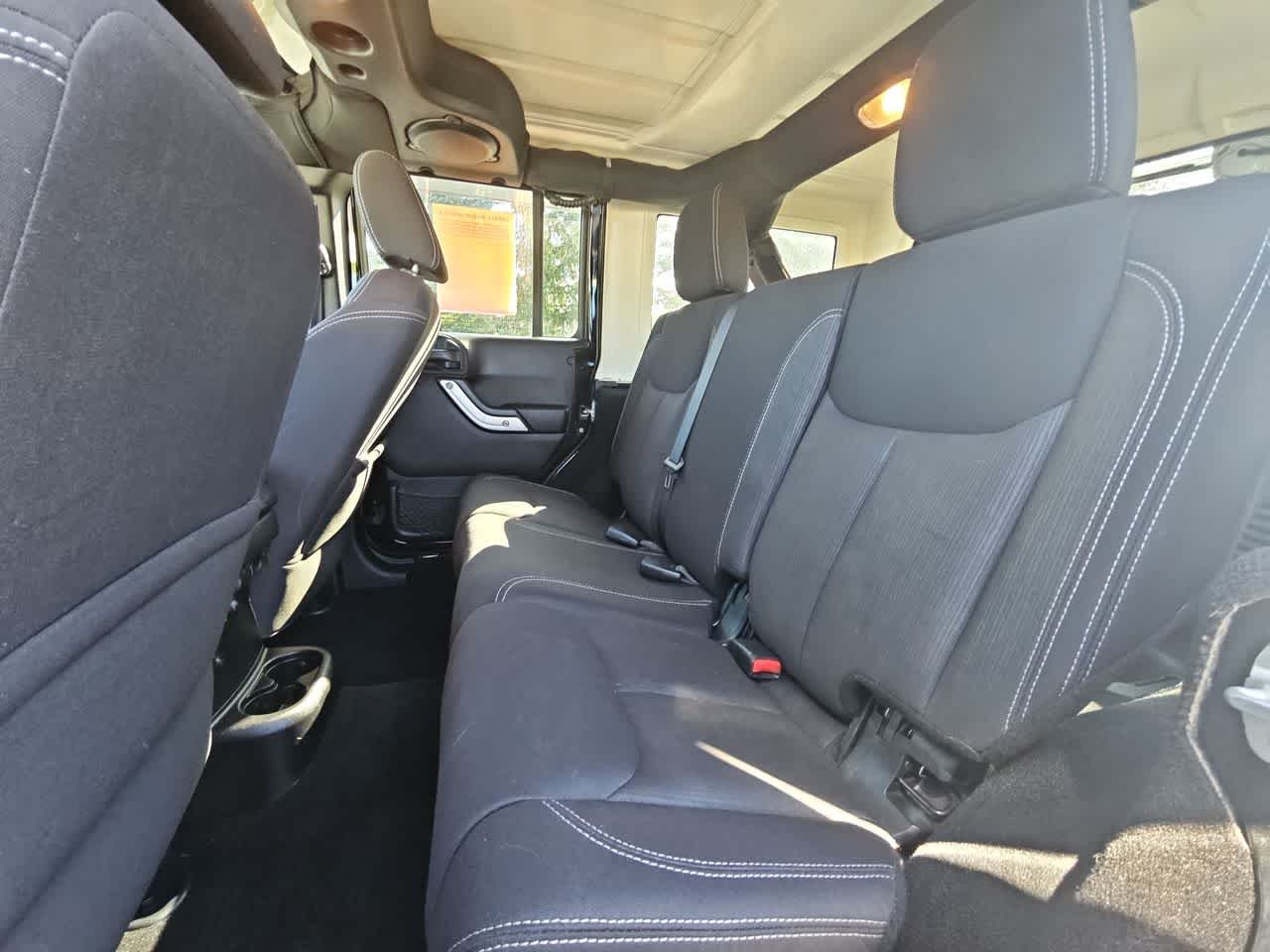 Used 2014 Black Clear Coat Jeep Sahara image 13