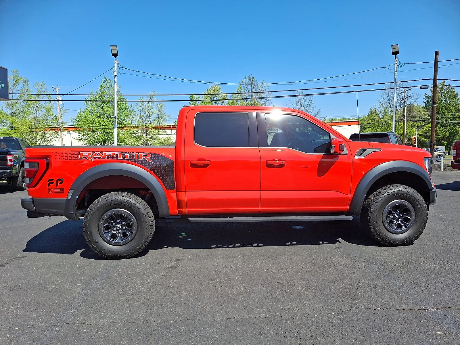 Used 2022 Code Orange Metallic Ford Raptor image 12