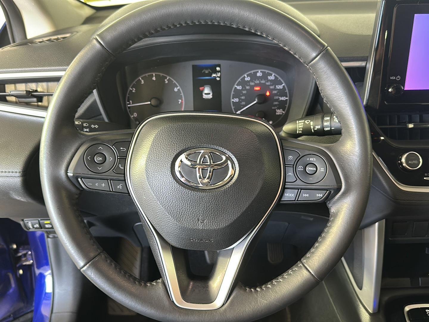 Certified Used 2024 Blue Crush Metallic Toyota LE image 12