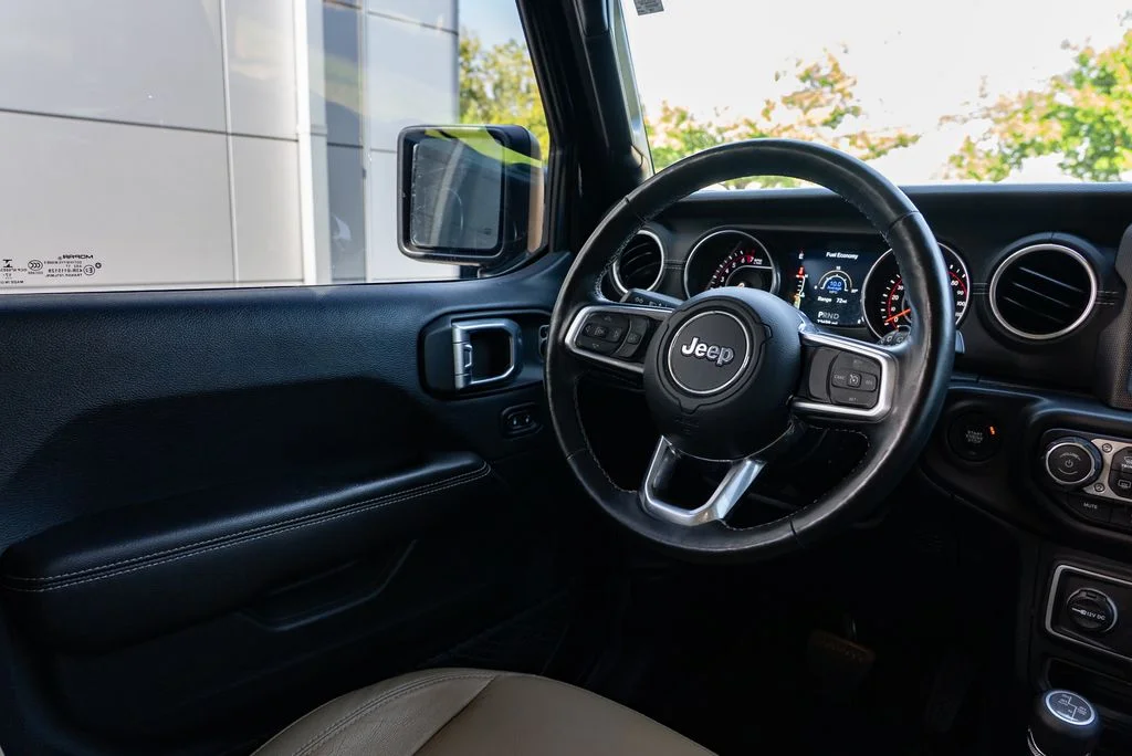 Used 2018 Black Jeep Unlimited Sahara image 12