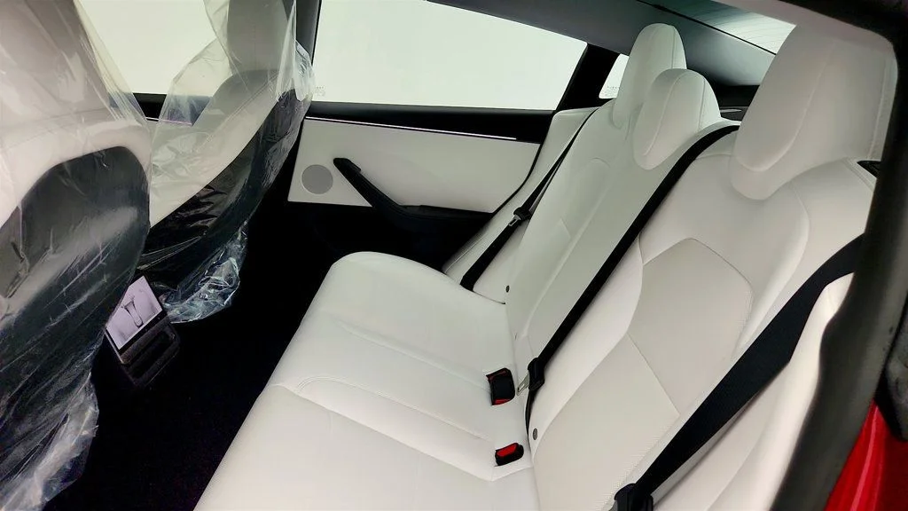 Used 2026 Ultra Red Tesla Long Range RWD w/ White & Black Premium Interior image 24