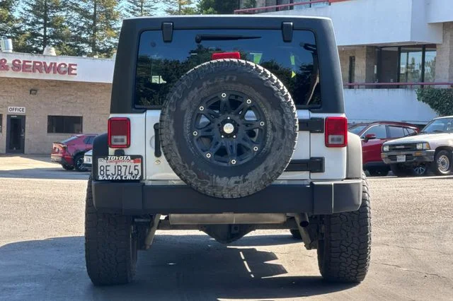 Used 2016 White Jeep Unlimited Sport image 5