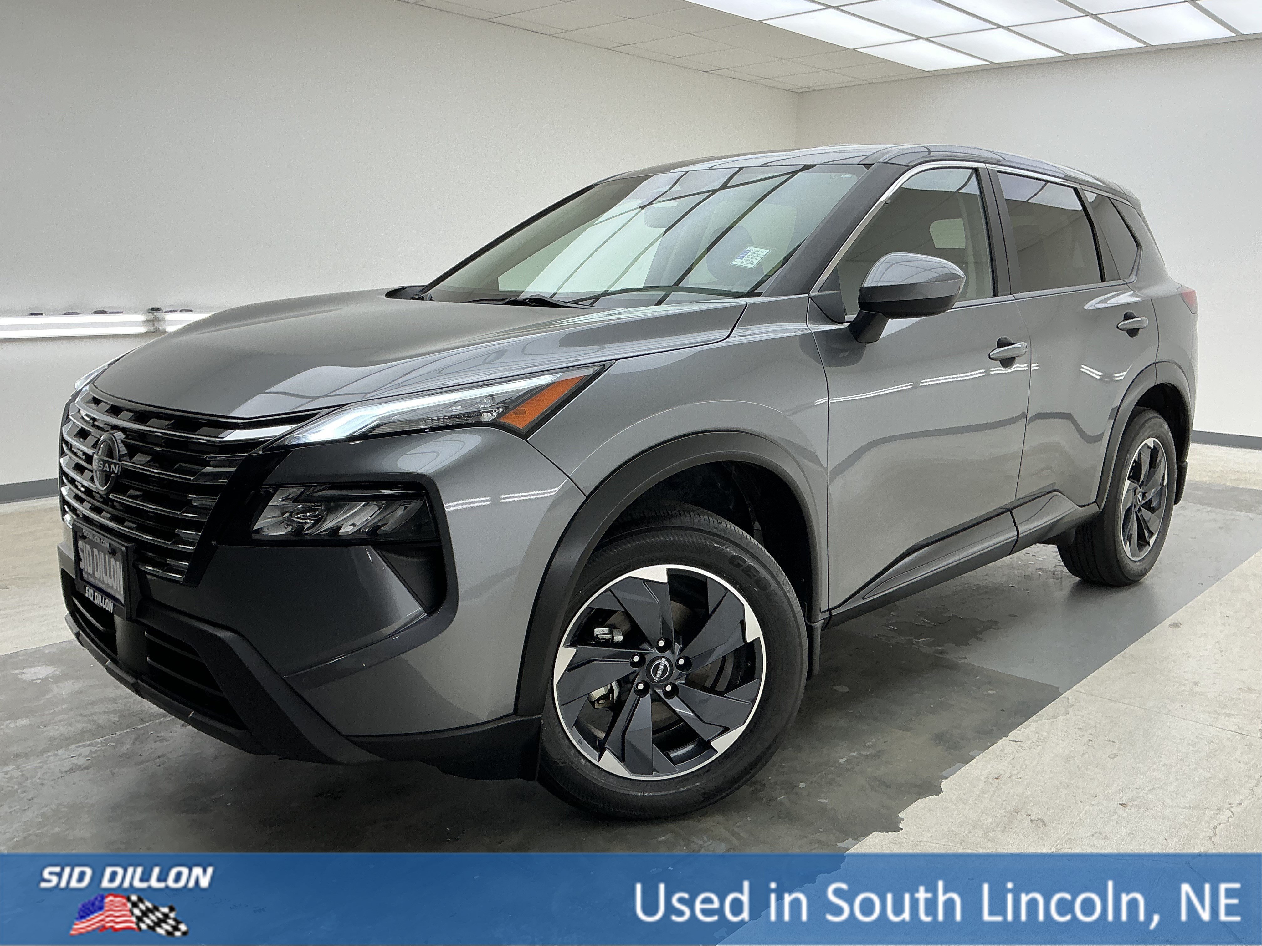 Used 2024 Gun Metallic Nissan SV image 1