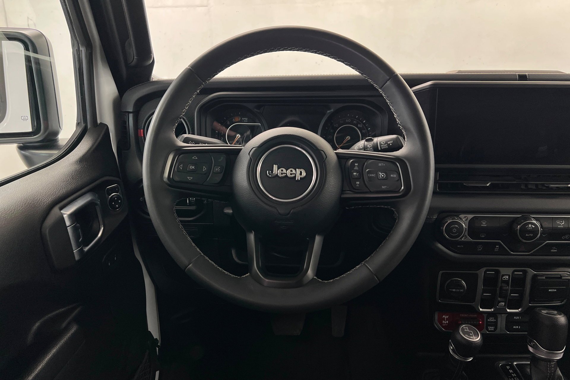 Used 2025 Bright White Clearcoat Jeep Rubicon image 13