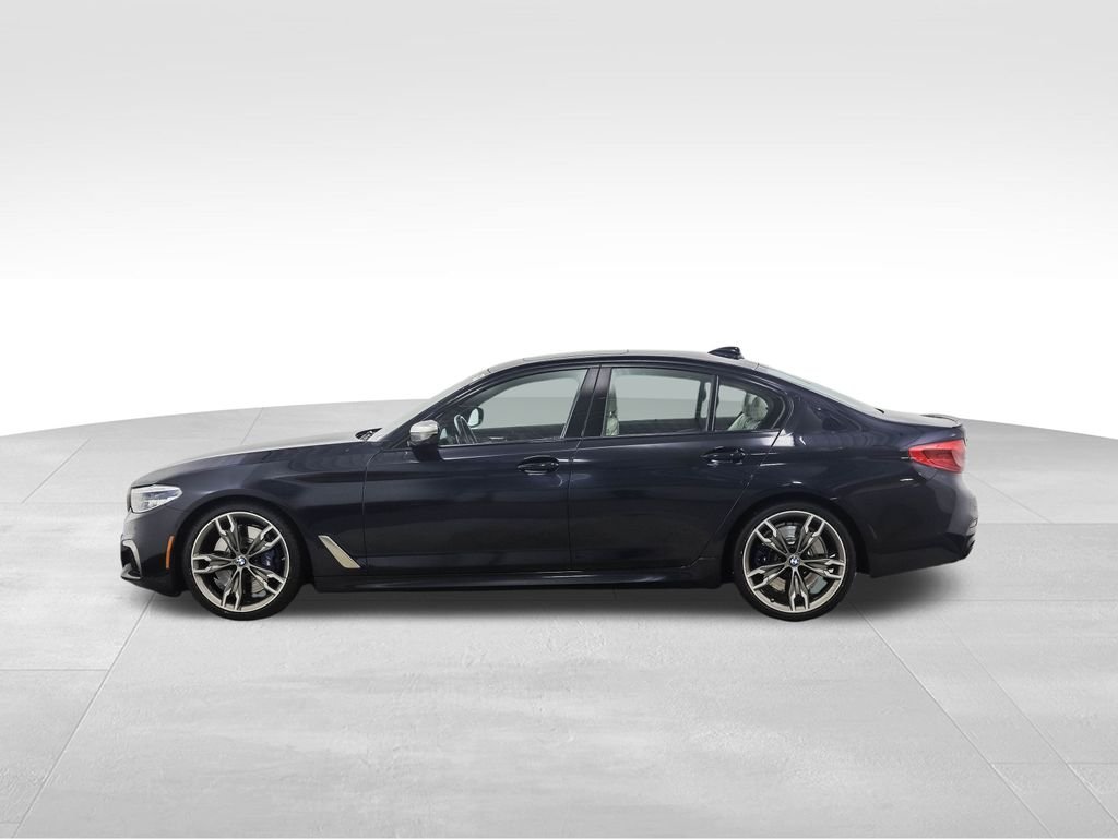 Used 2020 BMW 5 Series M550i with VIN WBAJS7C0XLCD42528 for sale in Minneapolis, Minnesota