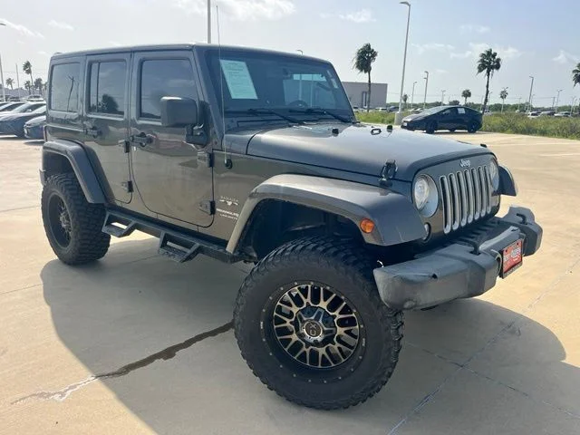 Used 2018 Gray Jeep Unlimited Sahara image 1