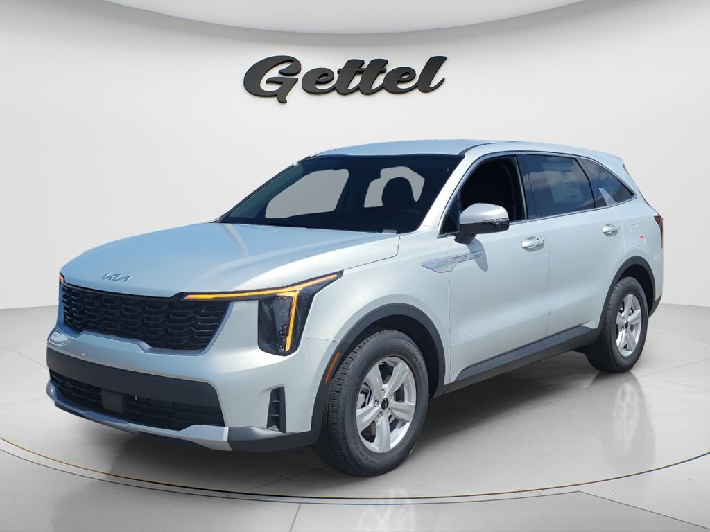 New 2026 Ivory Silver Kia LX image 1