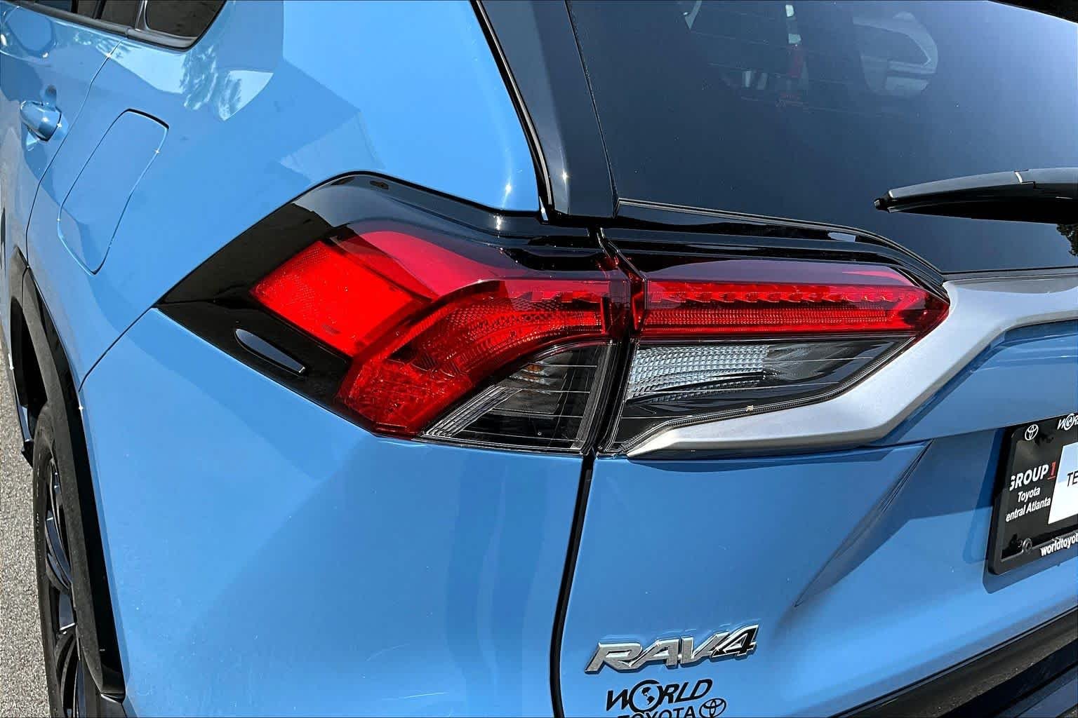 Used 2024 Cavalry Blue/Midnight Black Metallic Toyota Hybrid XSE image 28