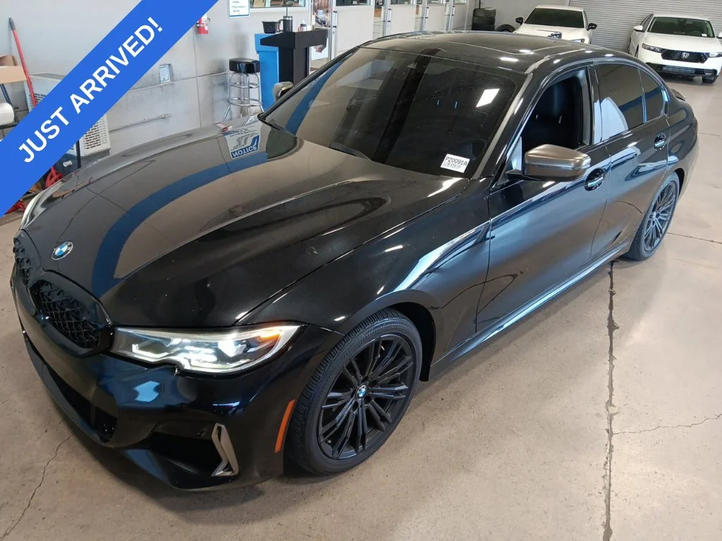 Used 2020 Black Sapphire Metallic BMW M340i xDrive image 1