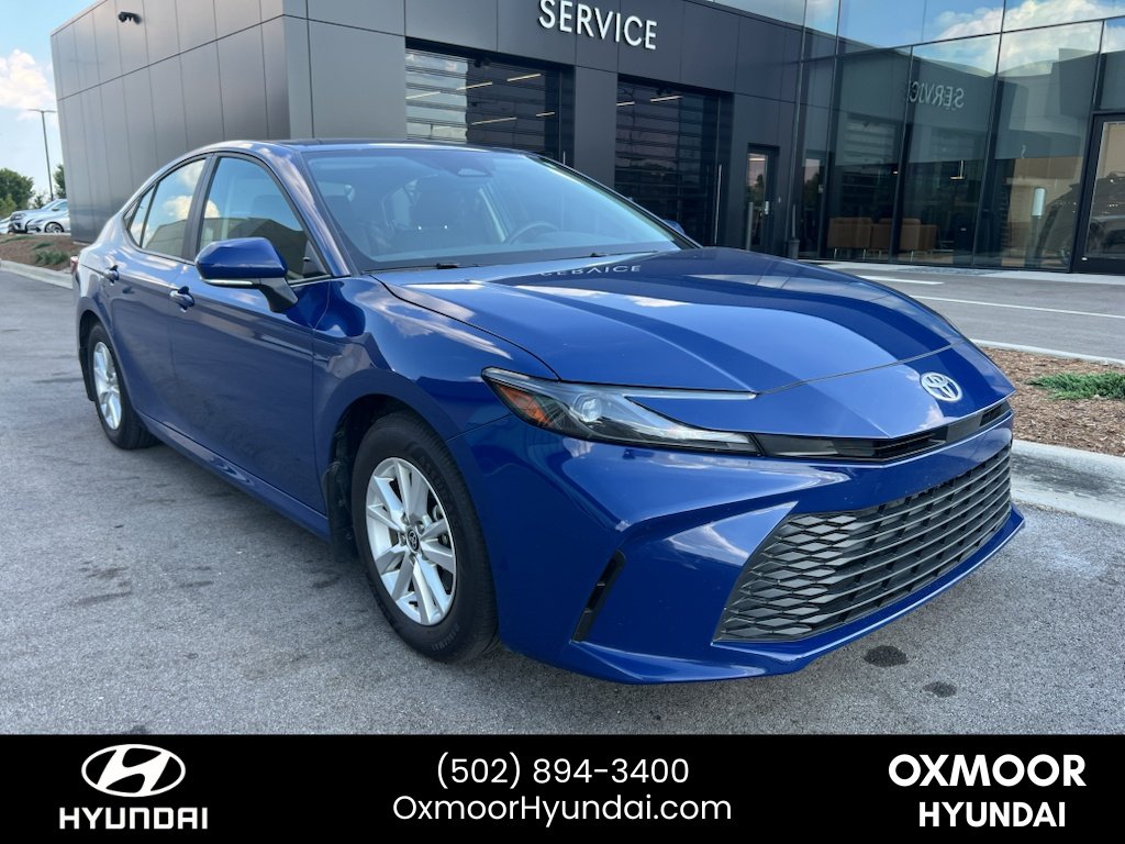 Used 2025 Reservoir Blue Toyota LE image 1
