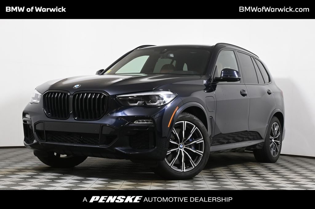 Used 2021 Black BMW xDrive45e image 1