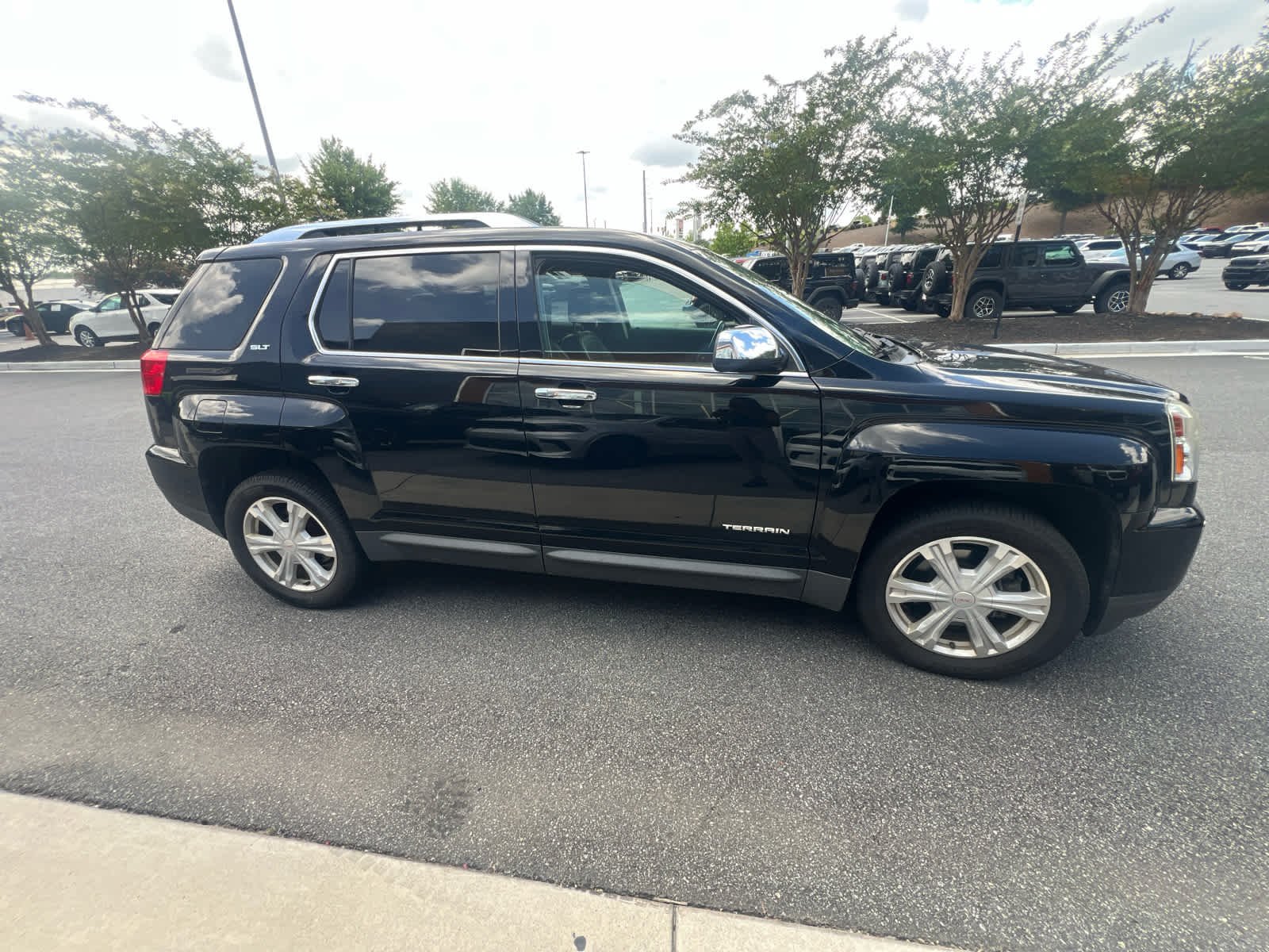 Used 2017 Ebony Twilight Metallic GMC SLT image 5