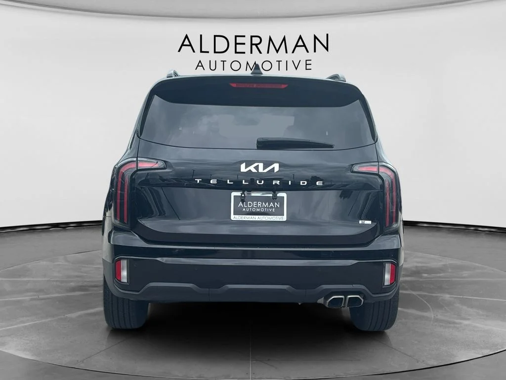 Used 2024 Black Kia EX X-Line image 4