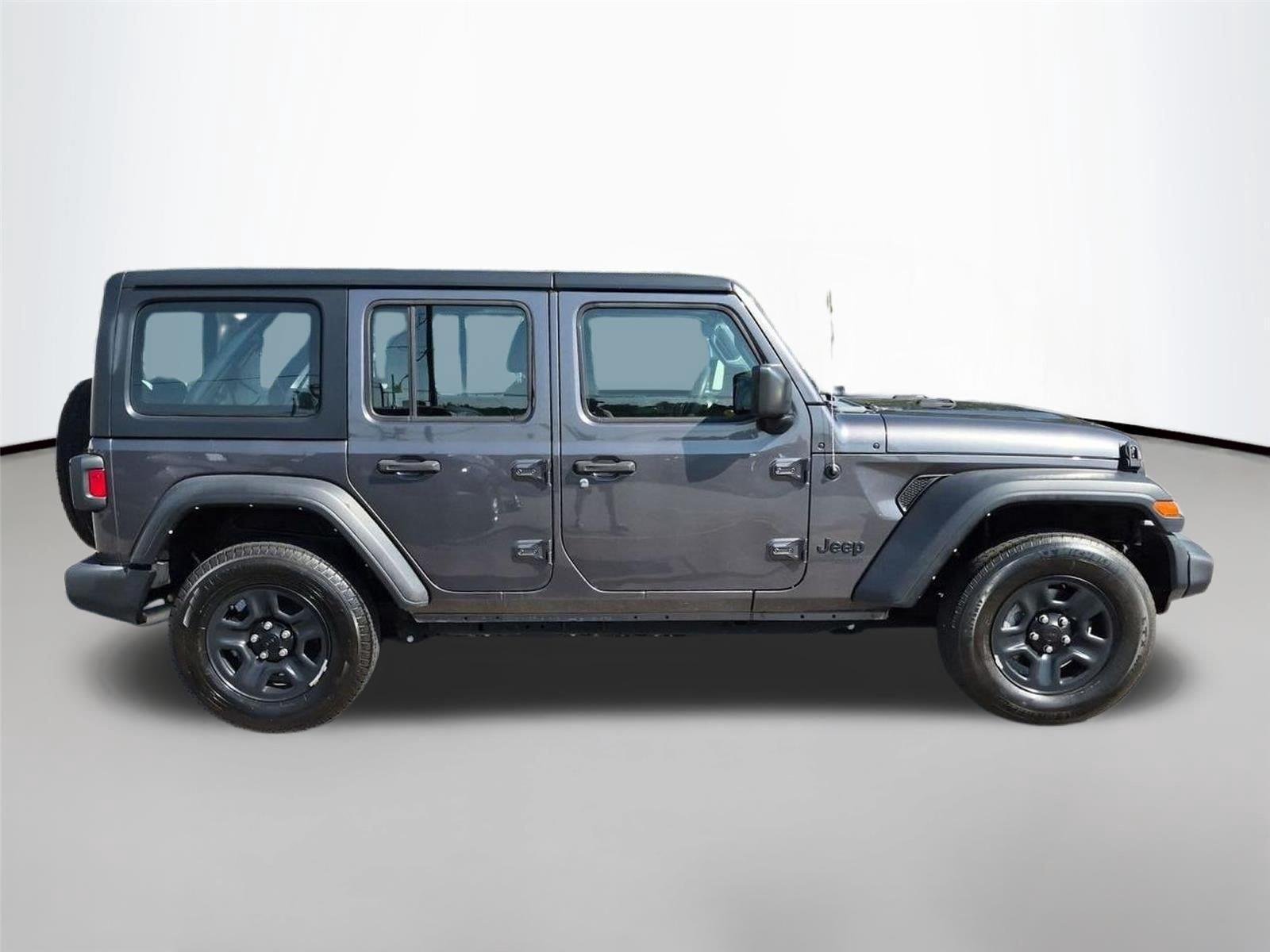 Used 2022 Granite Crystal Metallic Clearcoat Jeep Unlimited Sport image 6