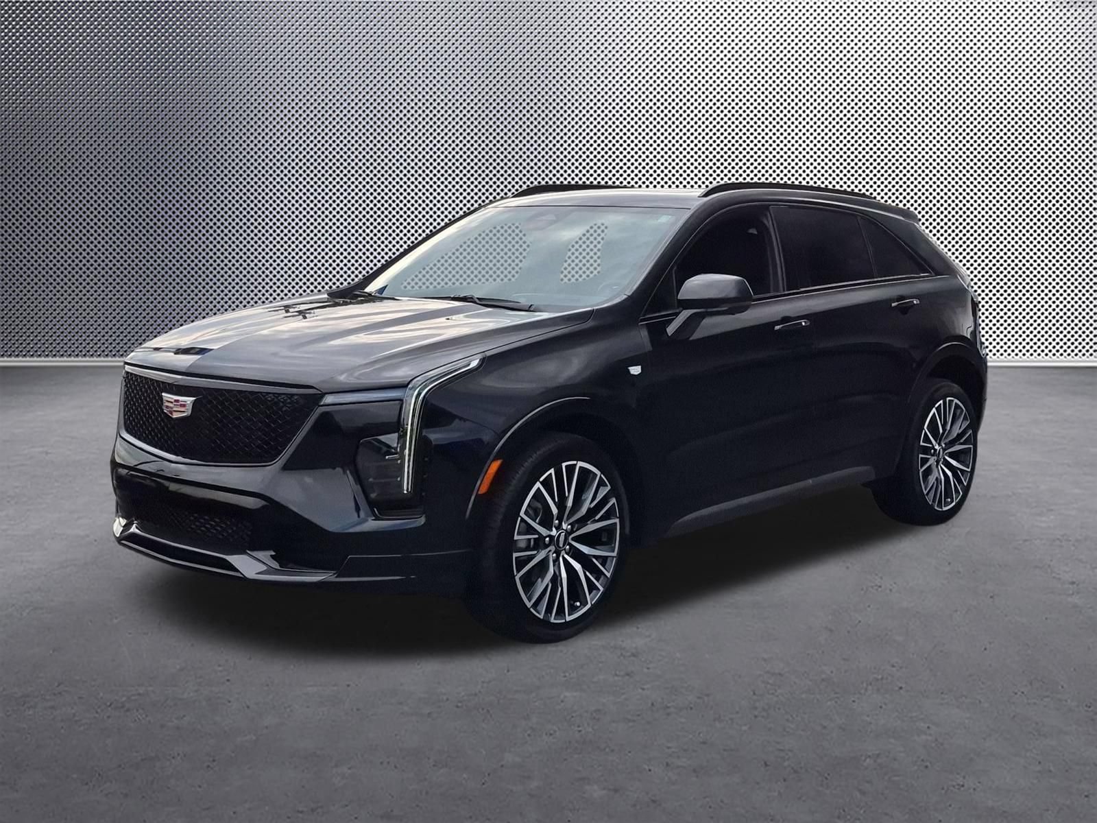 Used 2025 Stellar Black Metallic Cadillac Sport image 1
