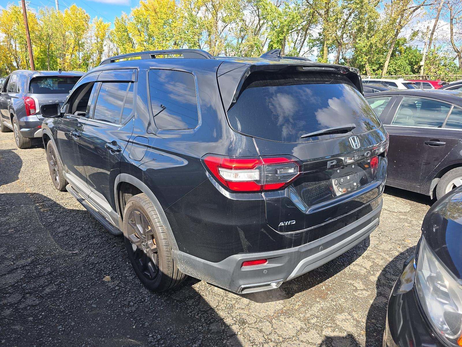 Certified Used 2025 Crystal Black Pearl Honda Touring image 2