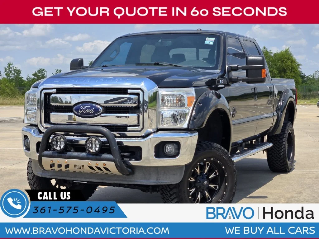 Used 2014 Black Ford Lariat image 1