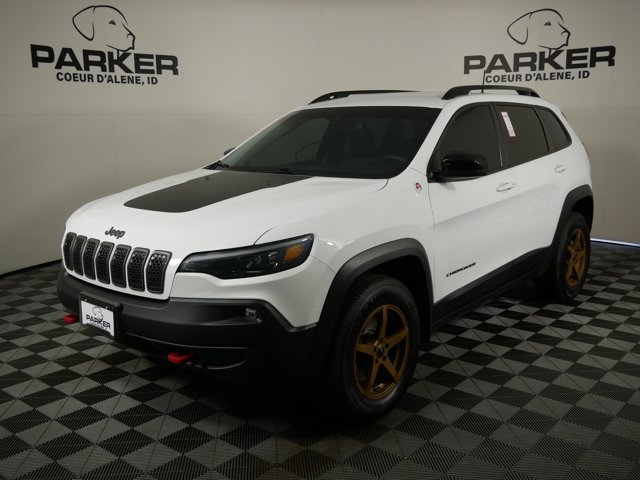 Used 2022 Bright White Clearcoat Jeep Trailhawk w/ Technology Pkg & Comfort Pkg image 1