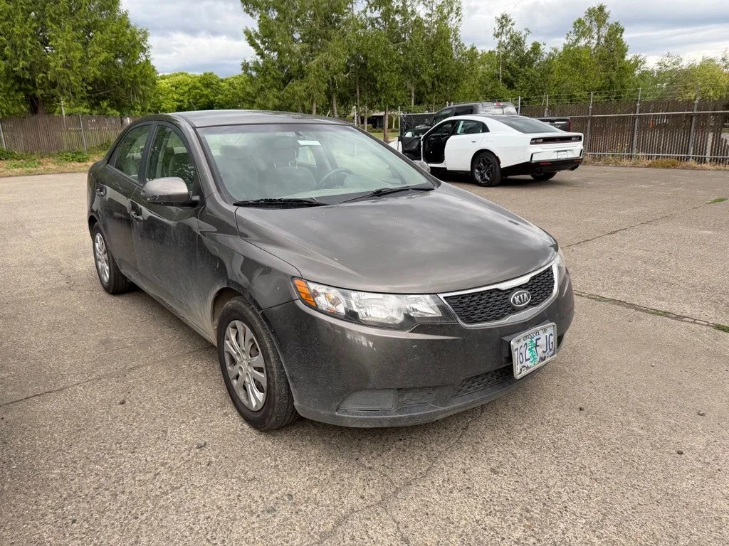 Used 2012 Brown Kia EX image 1