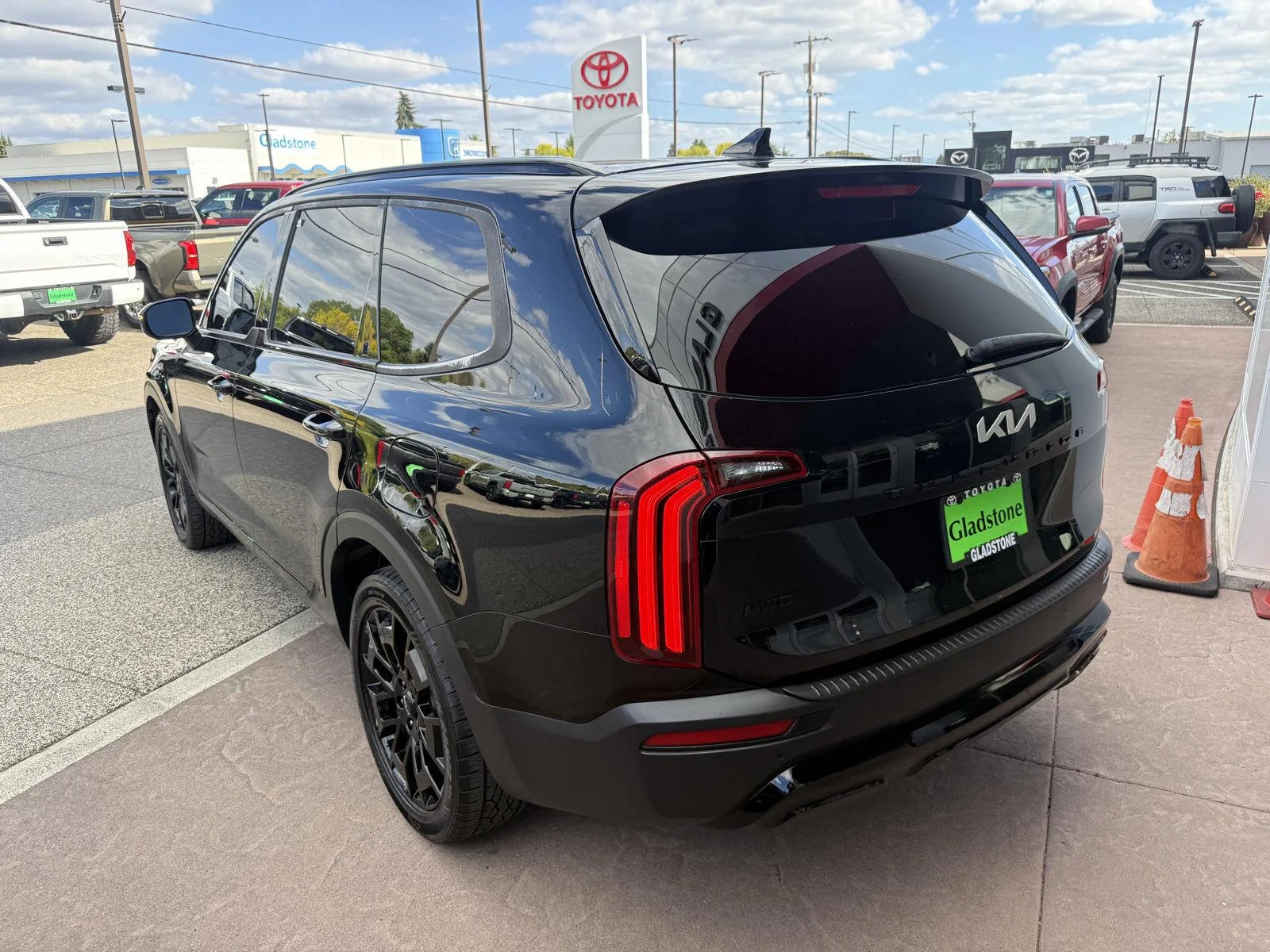 Used 2022 Ebony Black Kia EX image 4