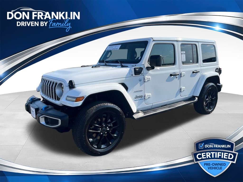 Used 2024 White Jeep Sahara 4xe image 1