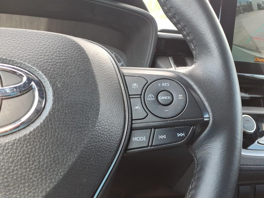 Used 2024 Sonic Silver/Jet Black Toyota Hybrid SE image 21