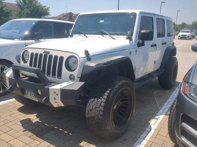 Used 2018 Bright White Clearcoat Jeep Unlimited Sahara image 1