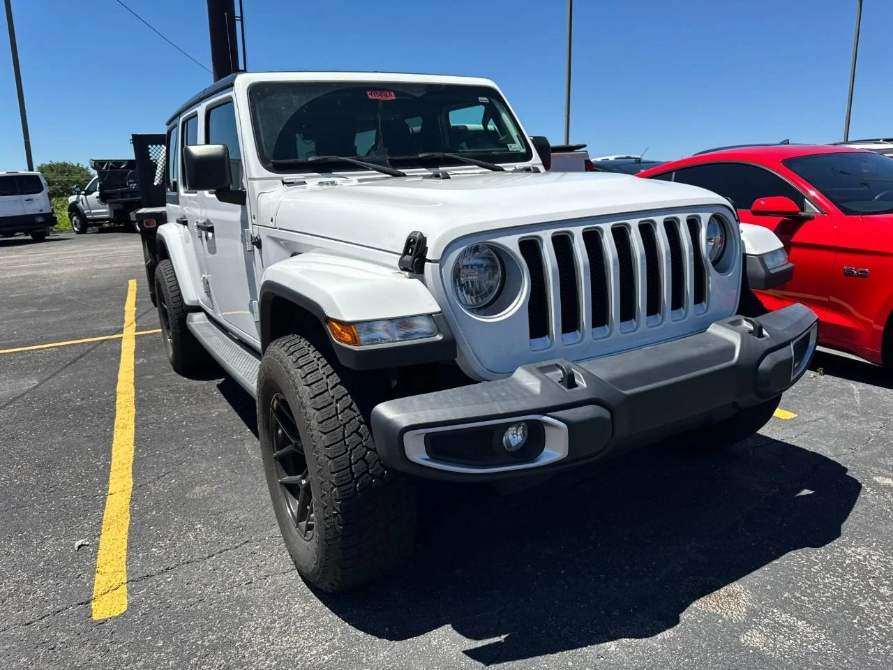 Used 2019 Bright White Clearcoat Jeep Sahara 4x4 image 2