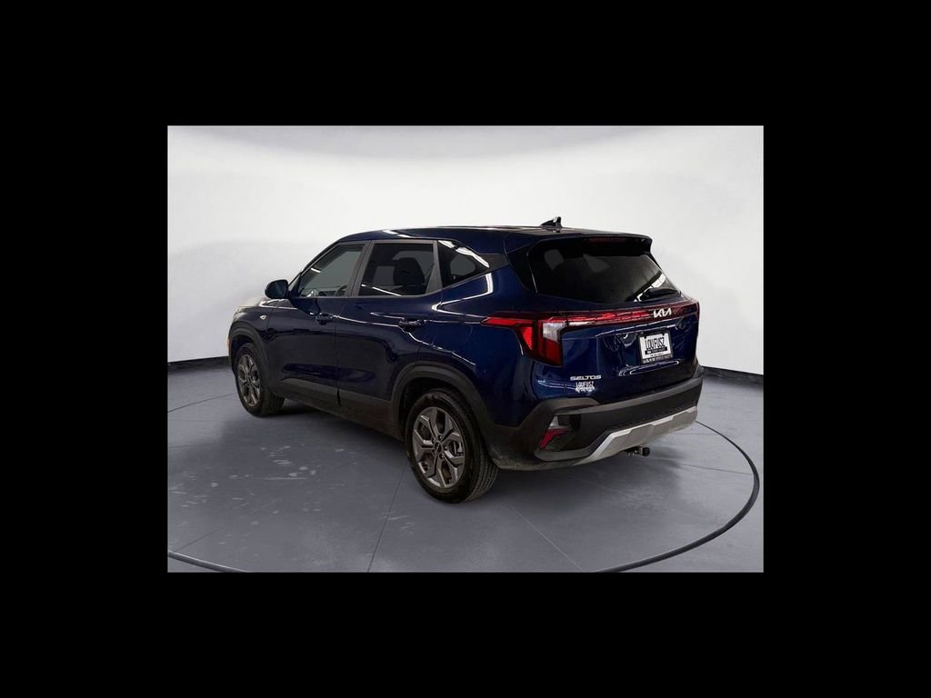 Used 2025 Blue Kia LX image 4