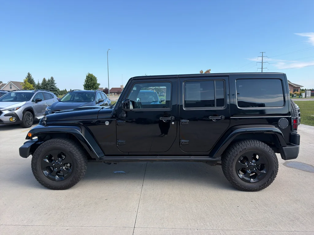 Used 2015 Black Clearcoat Jeep Altitude image 1