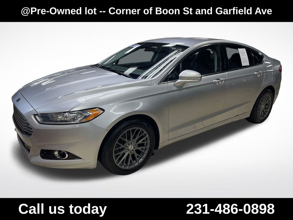 Used 2014 Silver Ford Titanium image 1