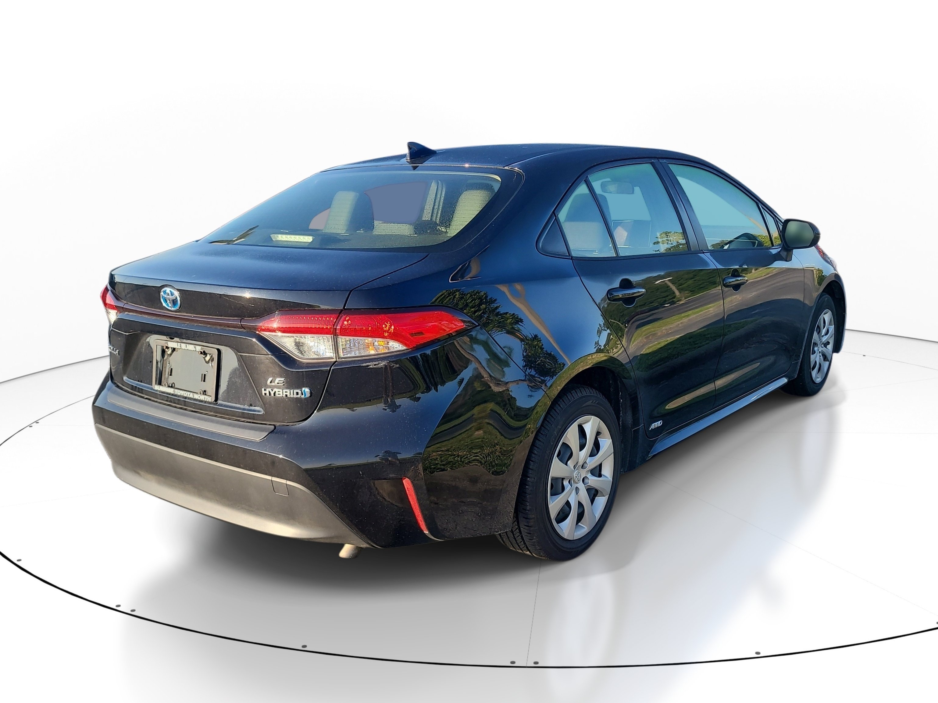 Used 2023 Midnight Black Metallic Toyota Hybrid LE image 6