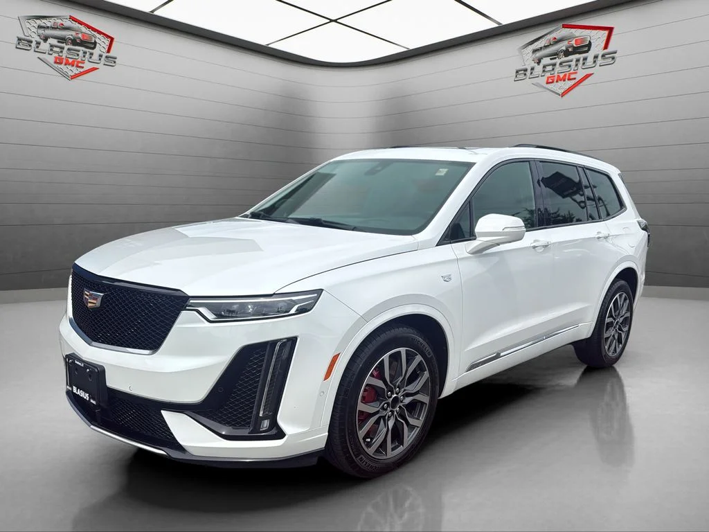 Used 2023 White Cadillac Sport image 1