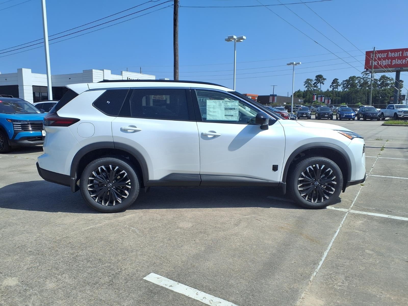 2026 Nissan Rogue Dark Armor™ White at Robbins Nissan