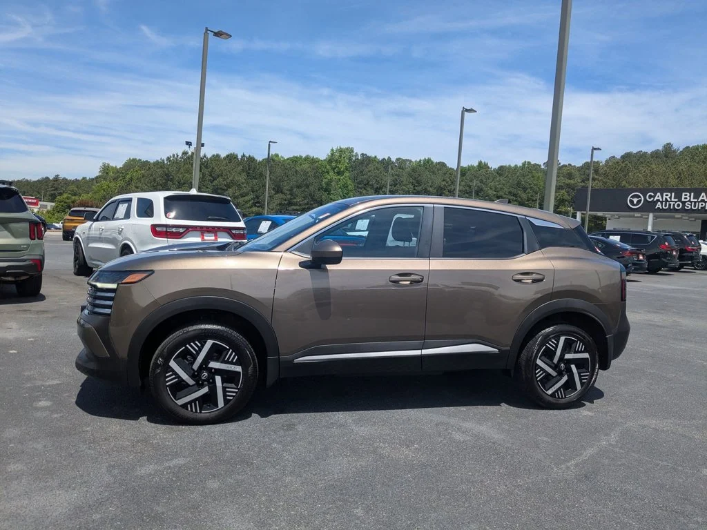 Used 2025 Canyon Bronze Metallic Nissan SV image 8